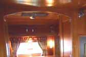 Photo shows great dark woodwork and cabinets in 1938 Kozy Coach Trailer